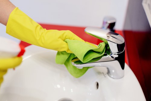 Technician applying risk controls during carpet cleaning